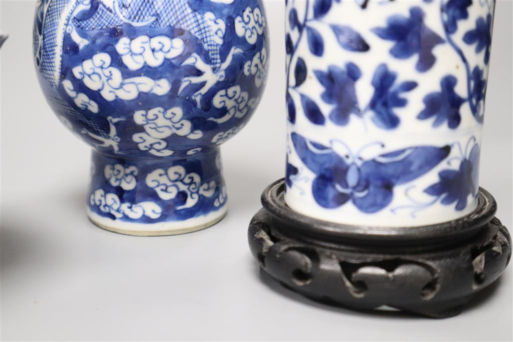 A Chinese blue and white vase with four-character mark, a similar cylindrical vase and a small bowl, tallest 21cm
